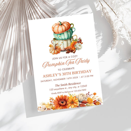 Invitation card for a pumpkin-themed tea party birthday celebration with pumpkins and flowers on a white background.