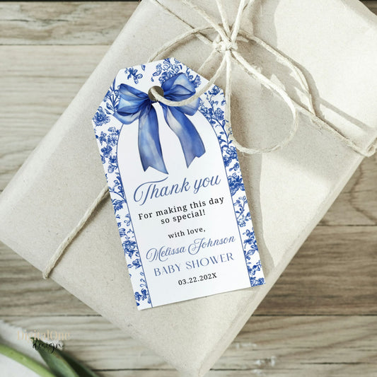 Baby shower thank you tag with Royal blue bow Chinoiserie design on a wrapped gift box