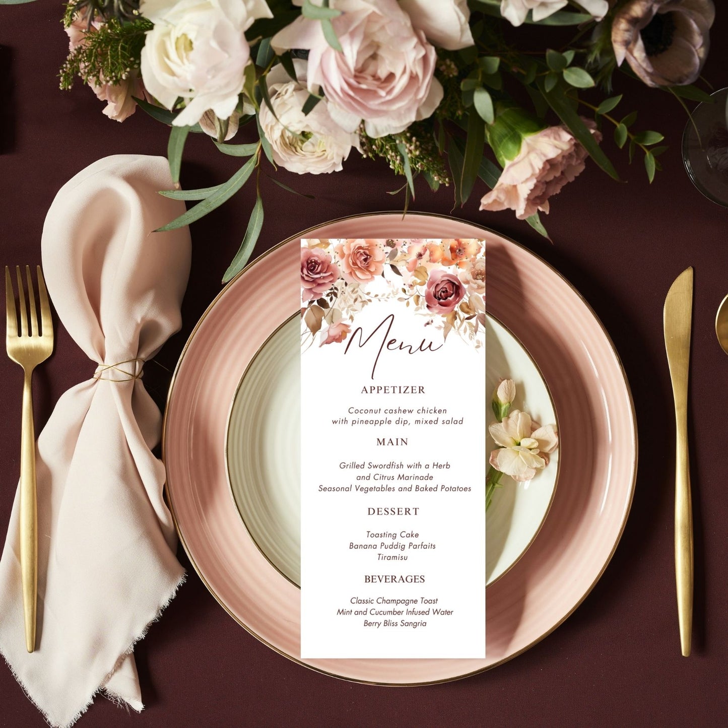 Fall Floral menu card on a table setting with plates, cutlery, and flowers.