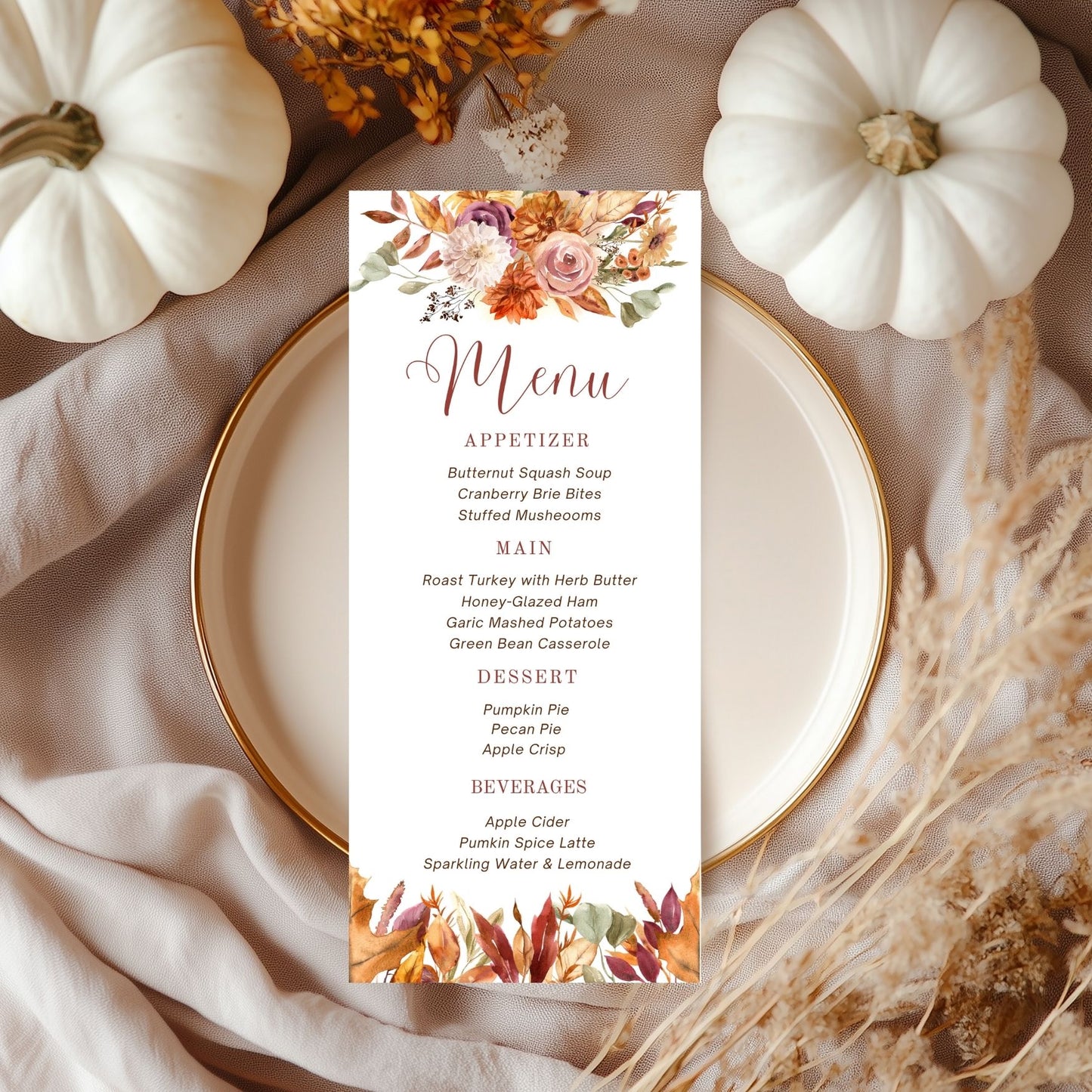 Fall Floral Menu card with autumn-themed design on a plate with pumpkins and dried flowers.