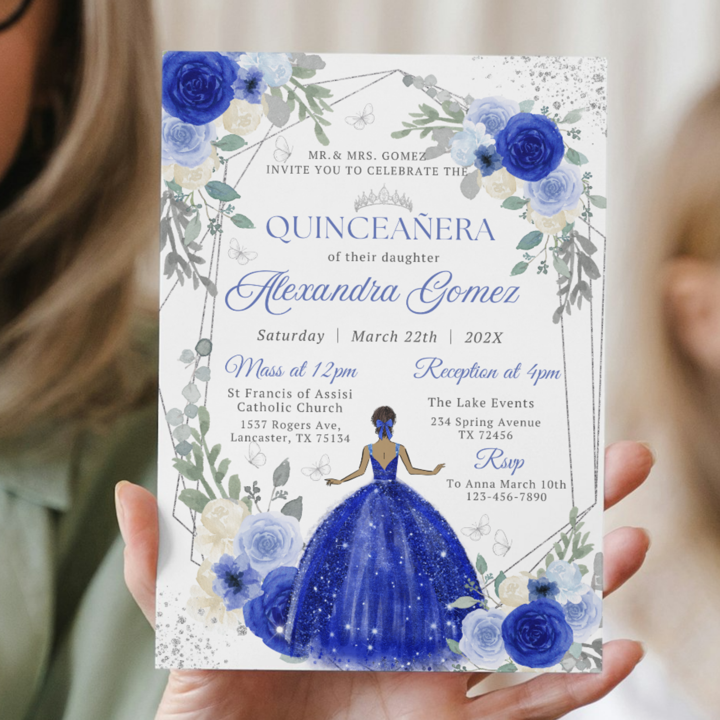 Quinceañera invitation with blue floral design held by a person