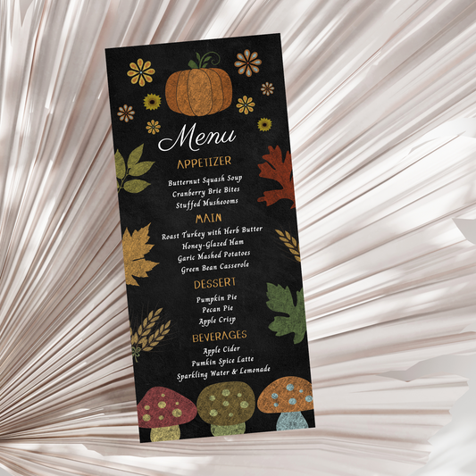 Thanksgiving Menu card with autumn-themed design featuring pumpkins, leaves, and mushrooms on a black background.
