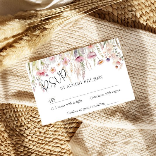 Watercolor Wildflower RSVP card on a textured beige surface