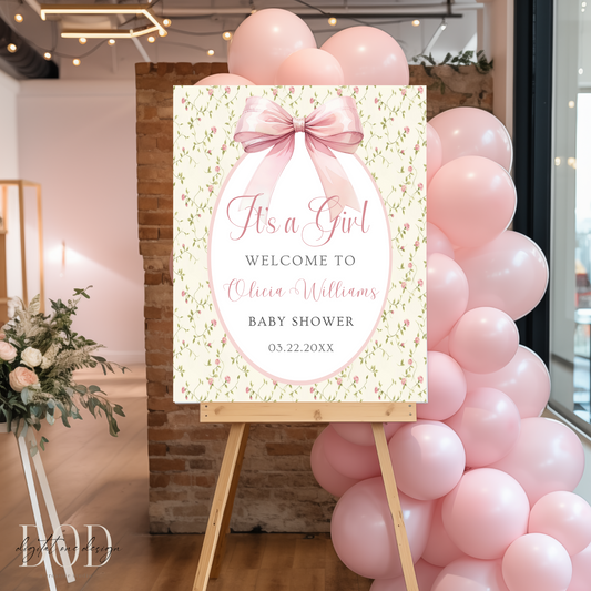 Elegant Grandmillennial Pink Bow Baby Shower Welcome Sign at a chic baby shower entrance with balloons.