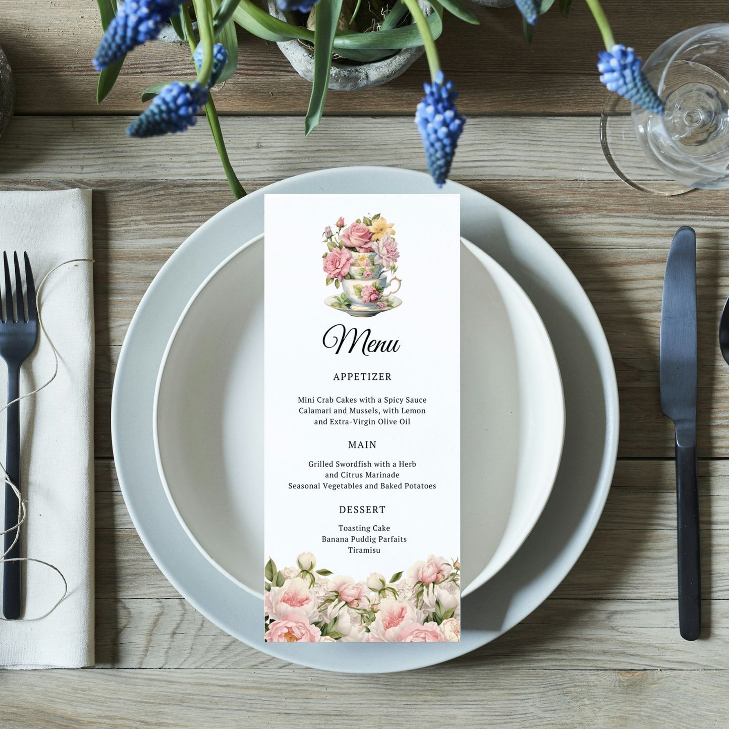 Printable Menu card with Tea Cup floral design on a table setting with plates, cutlery, and flowers