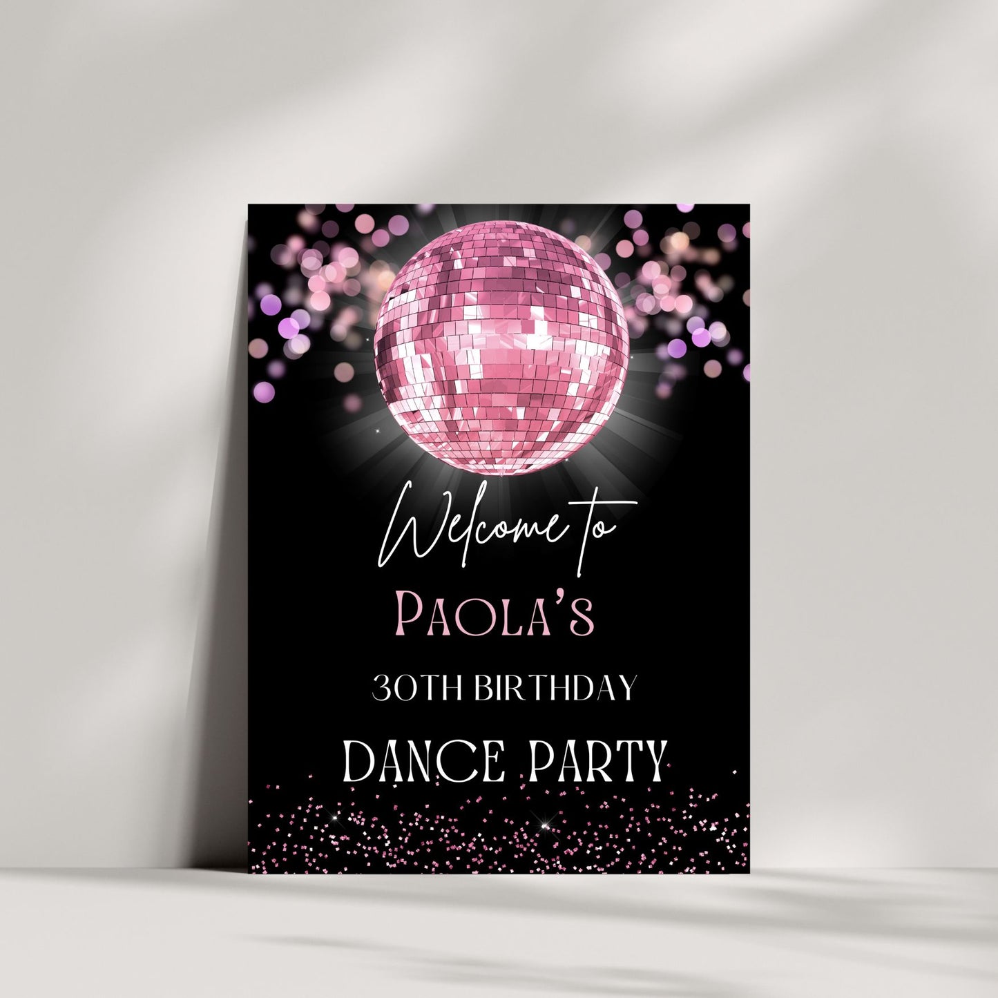 Party sign with pink disco ball and text on a black background