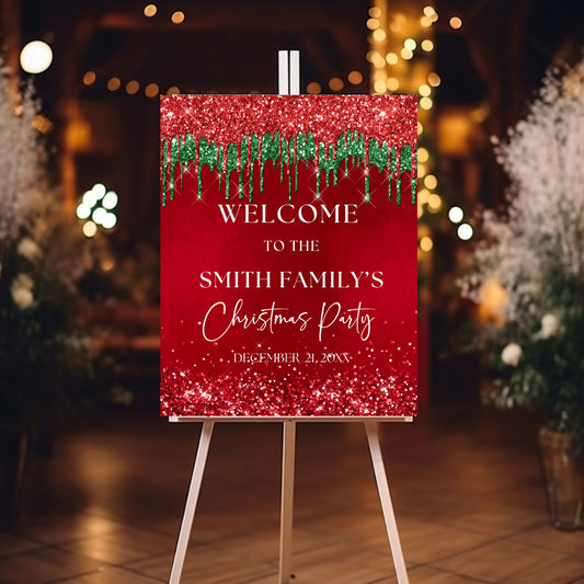 Red Green glittery Christmas party sign on an easel with decorative lights in the background