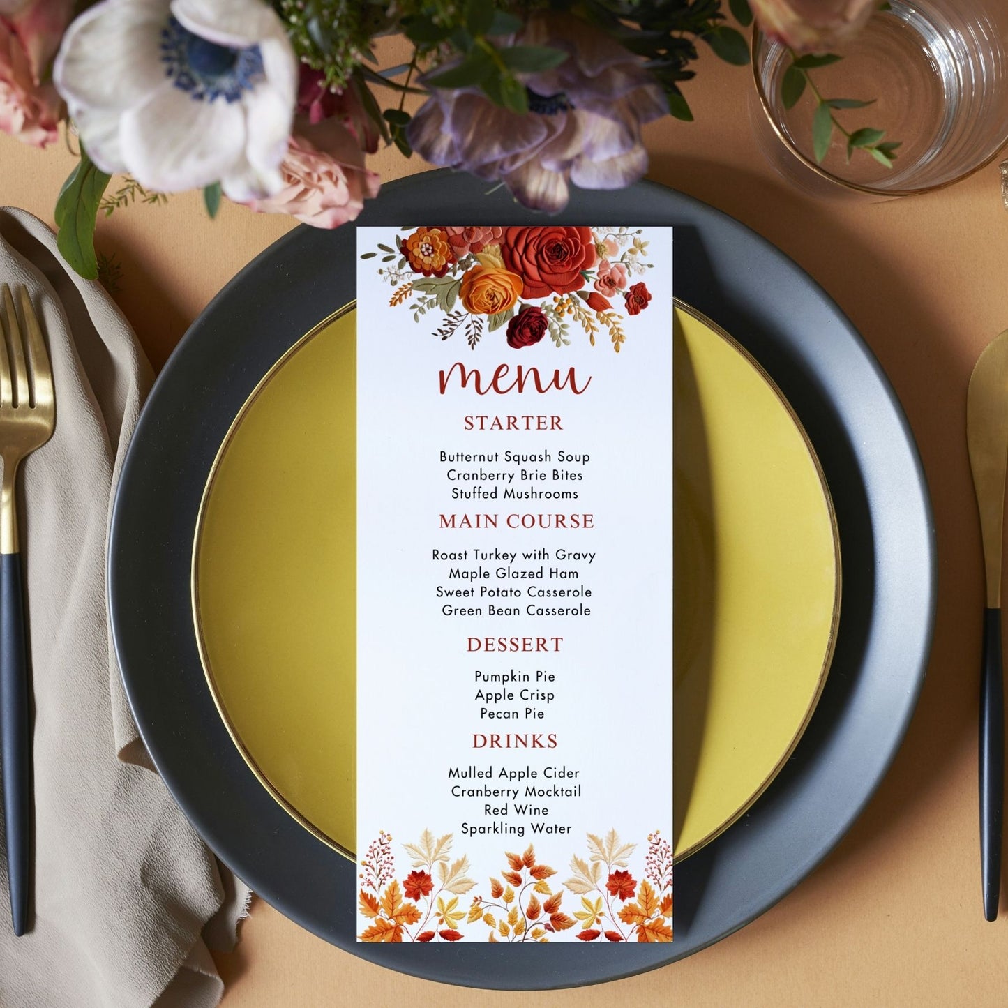 Menu card with autumnal Floral design on a set table with plates and cutlery.
