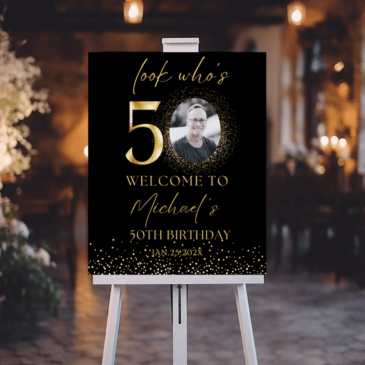 Editable Black Gold 50th Birthday Welcome Sign with photo showcased on an easel for Michael's 50th birthday celebration.