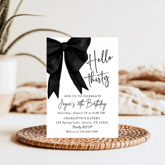 Elegant black bow birthday invitation for Hello Thirty milestone, minimalist design with sophisticated charm.