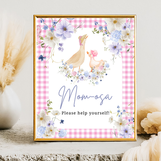 Decorative sign with ducks and flowers on a pink checkered background, framed in gold.