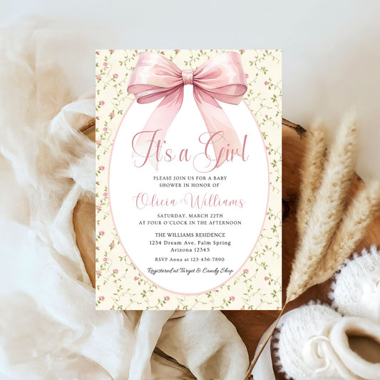 Baby shower invitation with pink bow and floral design on a soft background