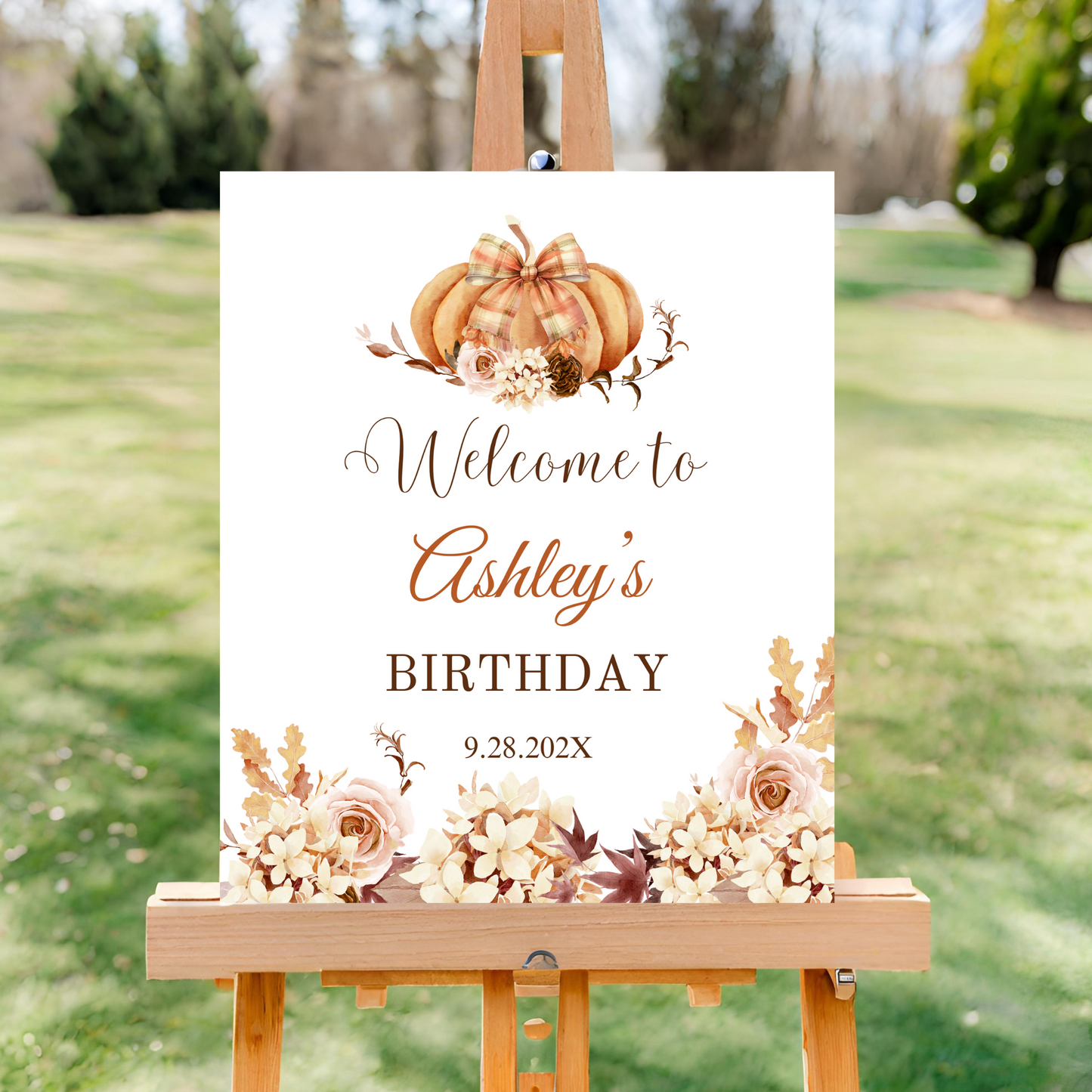 Editable Boho Fall Birthday welcome sign with pumpkin and flowers on an easel outdoors