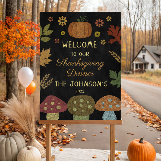 Thanksgiving dinner welcome sign with pumpkins and leaves in an autumn setting.