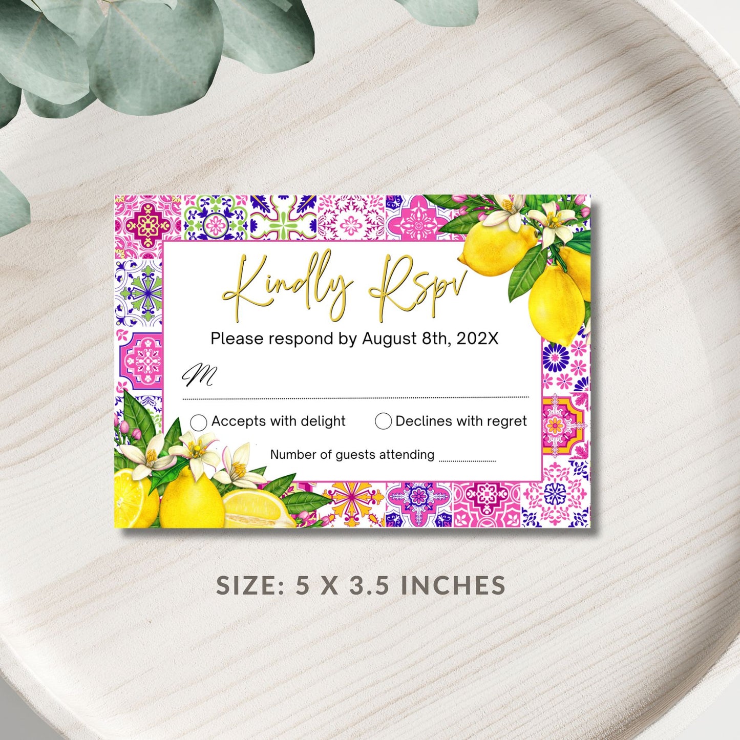 Mediterranean Pink RSPV card with floral and lemon design on a white surface