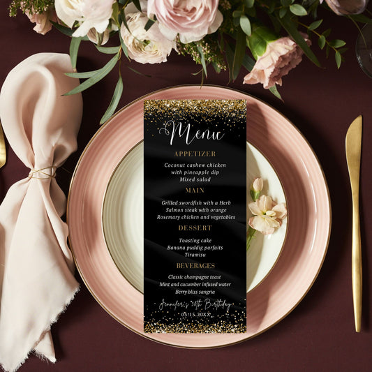 Elegant Black and gold Menu card on a plate with floral decorations and table setting