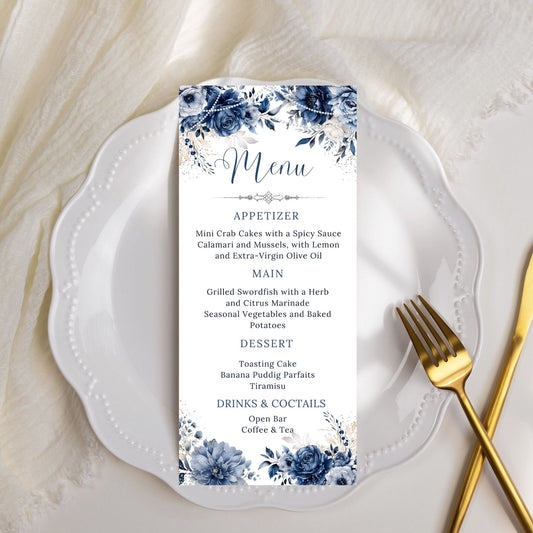 Menu card with blue floral and pearls design on a white plate with gold fork