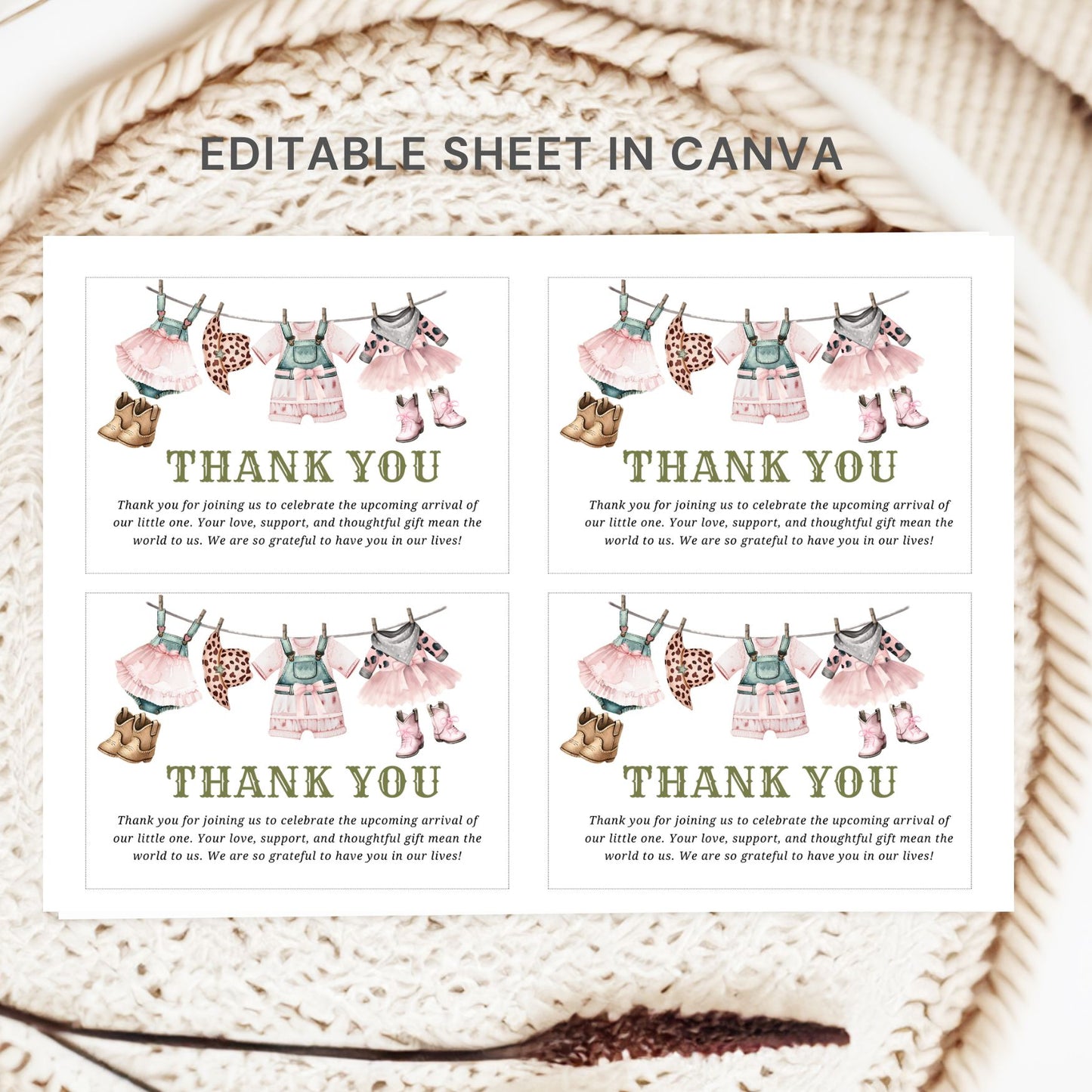 Three identical 'Thank You' cards with baby clothesline design on a textured surface.