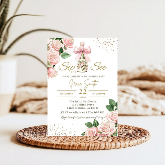 Sip and see Baby shower invitation with floral design on a woven mat