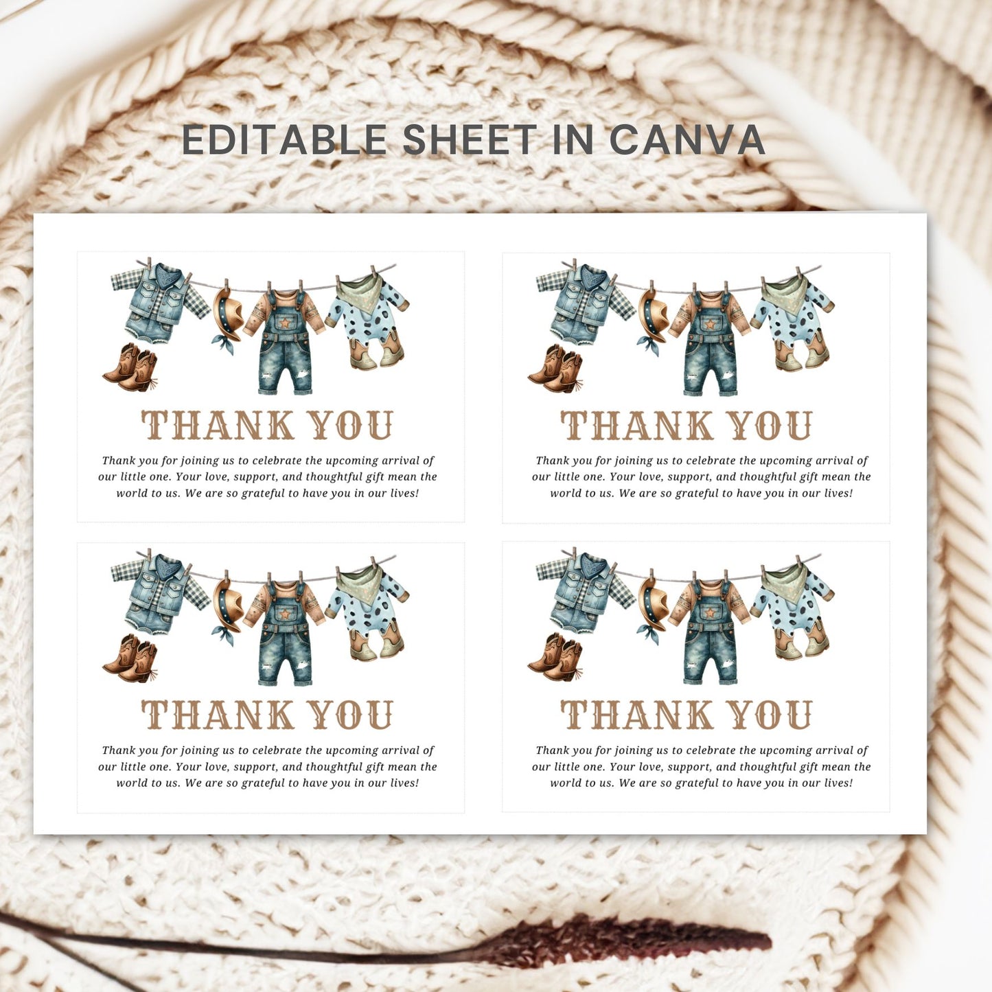Baby shower thank you cards with clothesline design on a textured surface