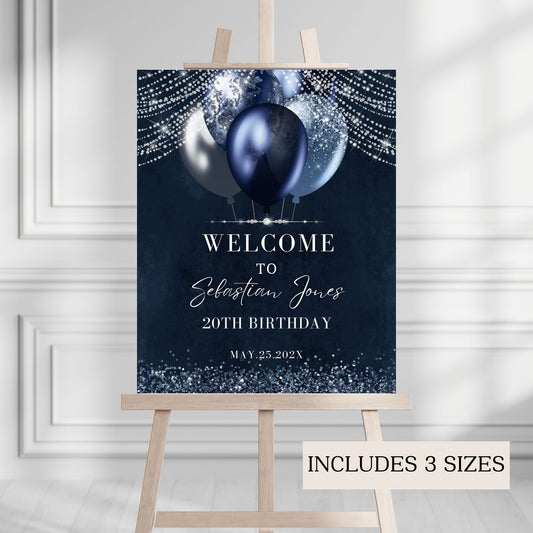 Birthday welcome sign with balloons on a stand against a gray background