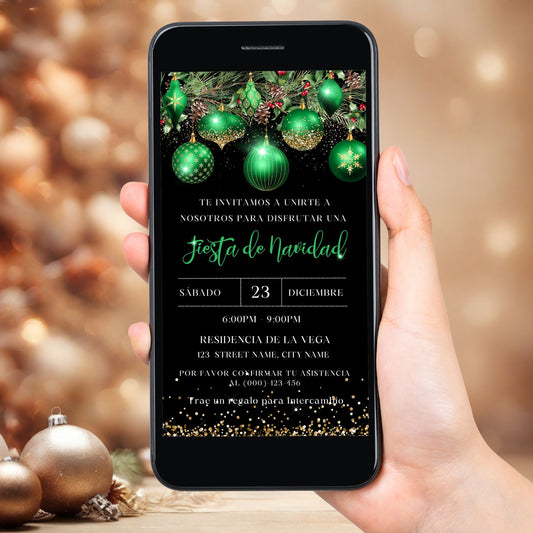 Hand holding a phone with a Green and Gold Christmas invitation on a blurred festive background