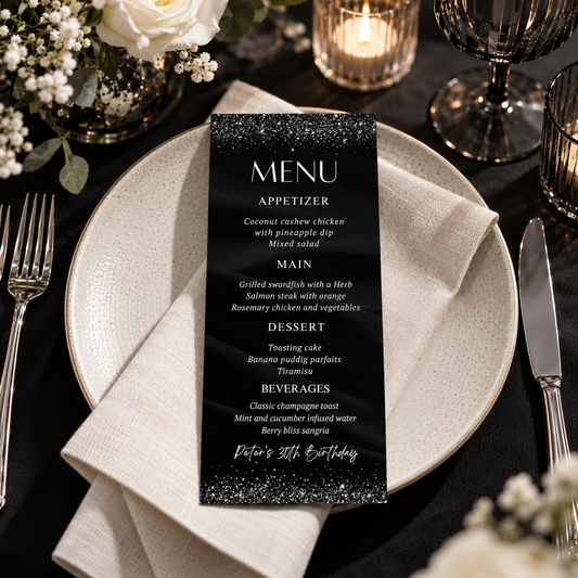 Elegant Black & Silver Birthday Menu Template displayed on a stylish table setting.