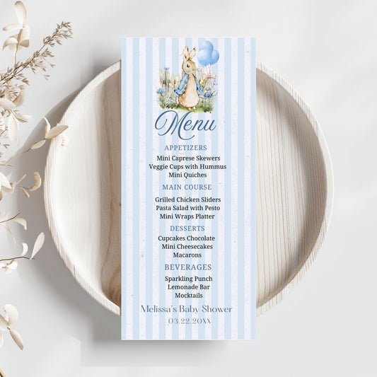 Menu card for a Peter Rabbit baby shower with a blue and white striped design featuring a rabbit character.
