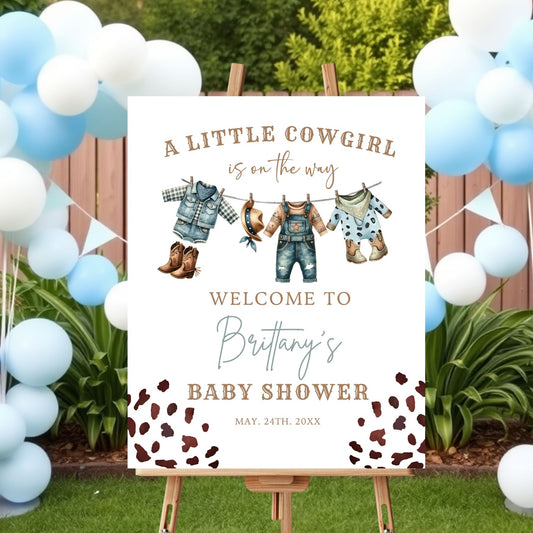 Baby shower sign for a little cowgirl with balloons and outdoor setting