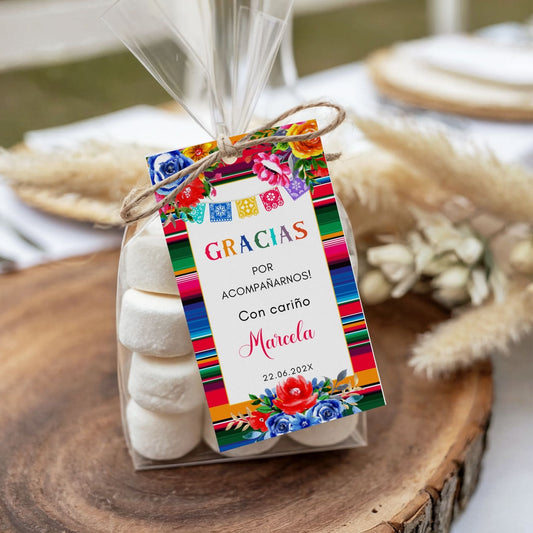 Packaged treat with a colorful Mexican Fiesta "Gracias"  tag on a wooden surface