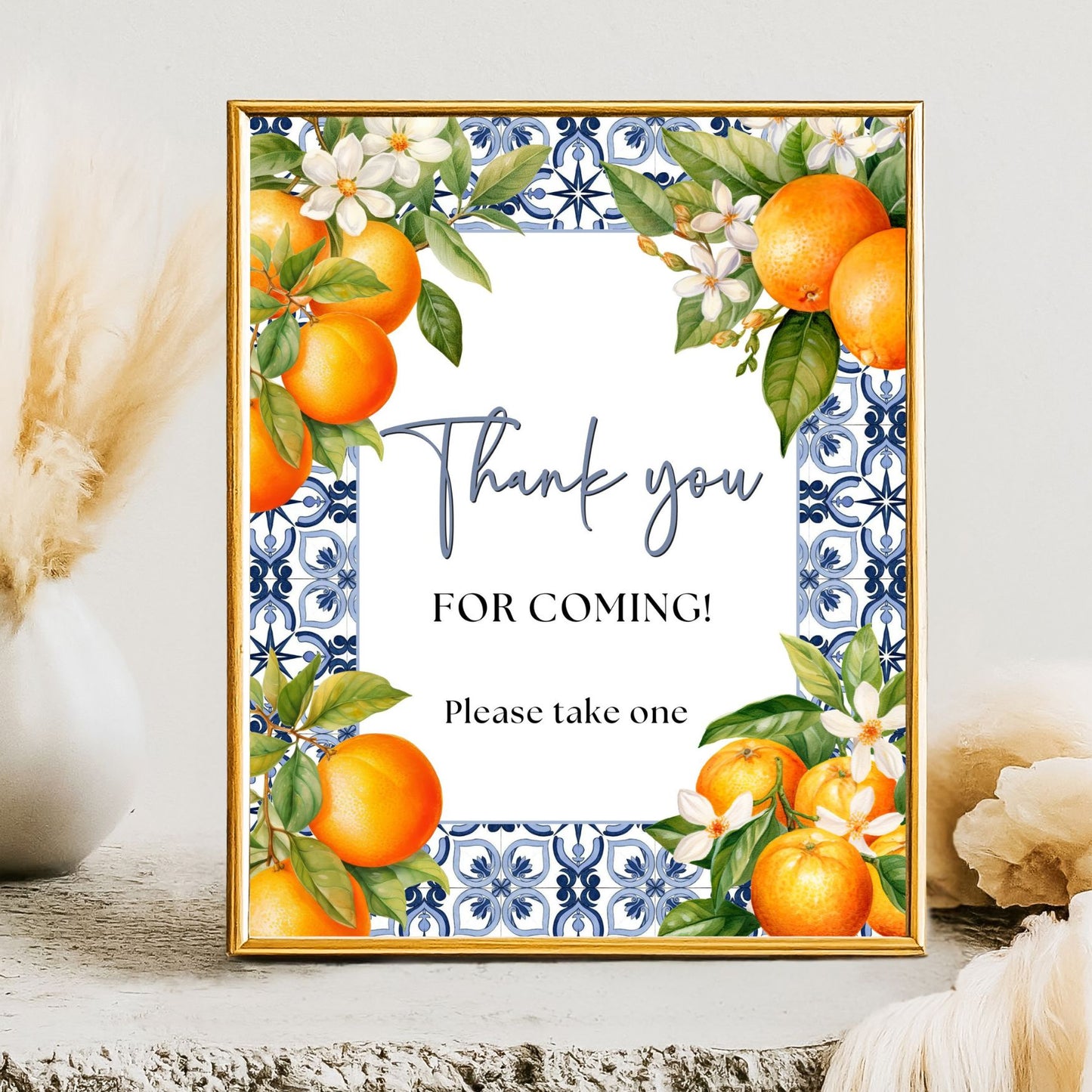 Decorative sign with Mediterranean and oranges, flowers, and a 'Thank you for coming' message on a patterned background.