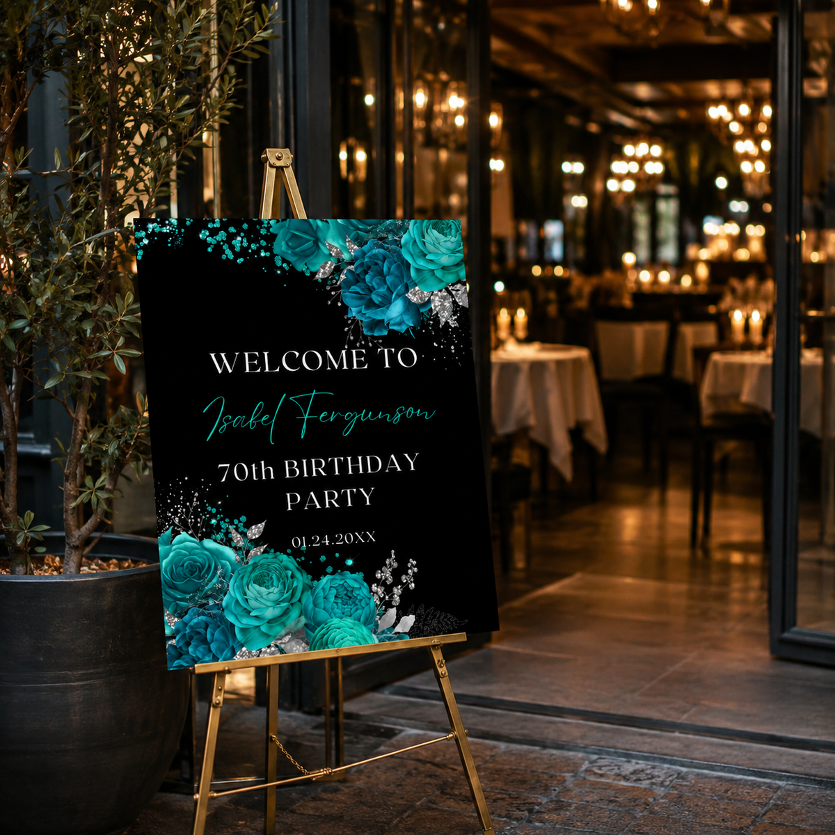 Elegant Teal and Silver Floral Birthday Party Welcome Sign displayed outside a venue for a 70th birthday celebration.