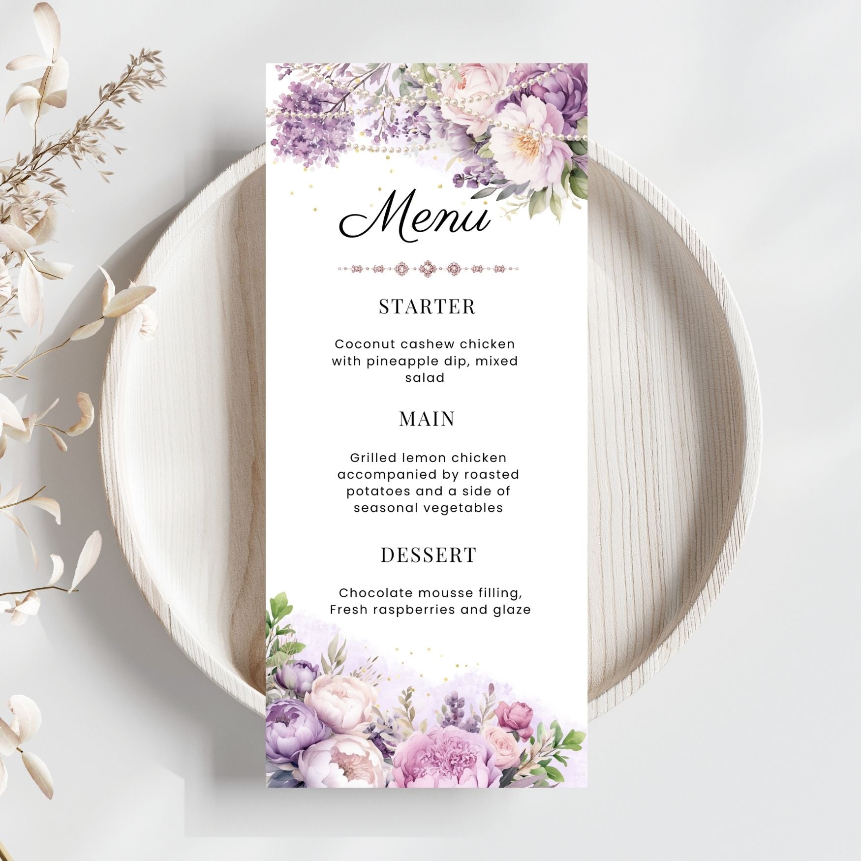Menu card with purple floral and pearls design on a white plate