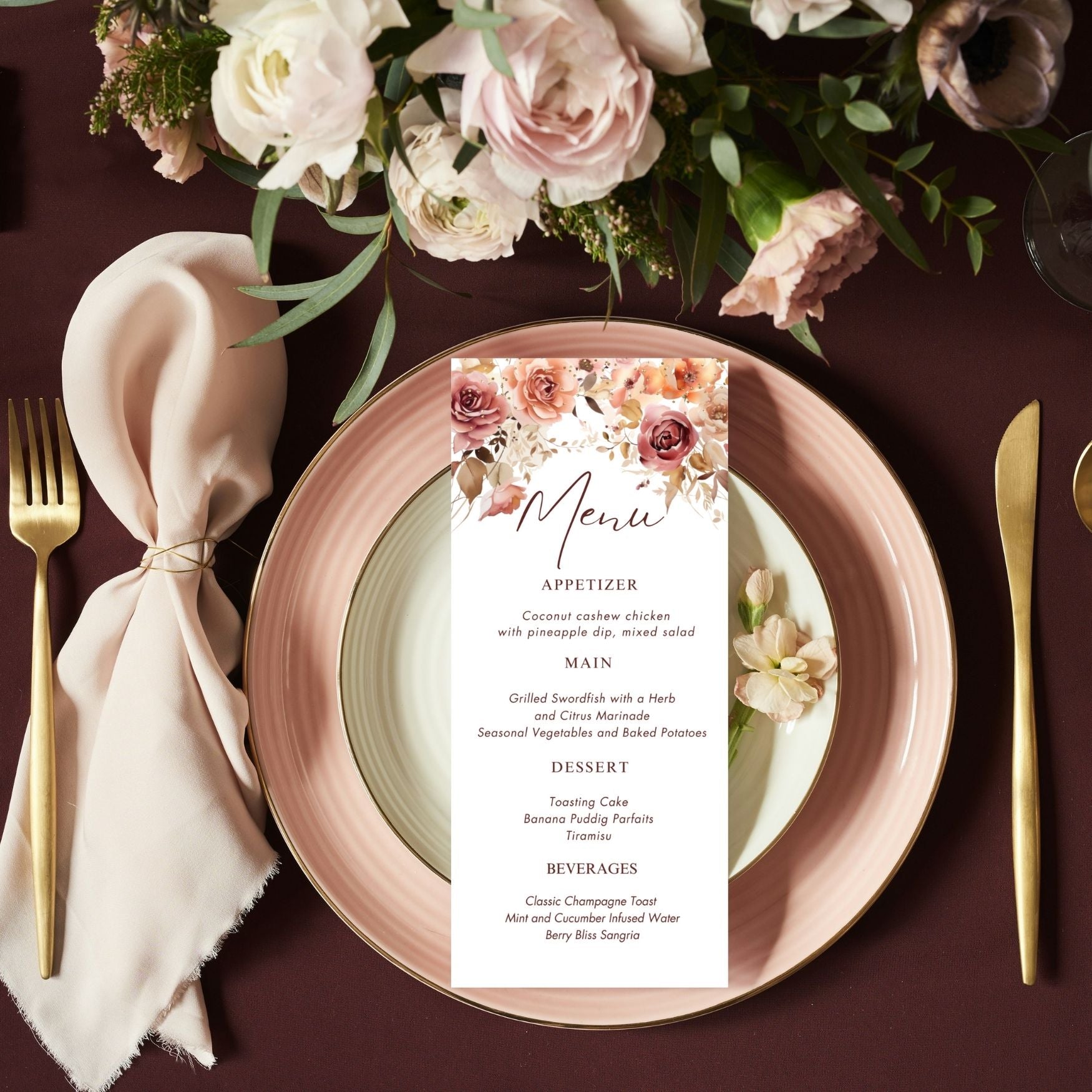 Fall Floral menu card on a table setting with plates, cutlery, and flowers.