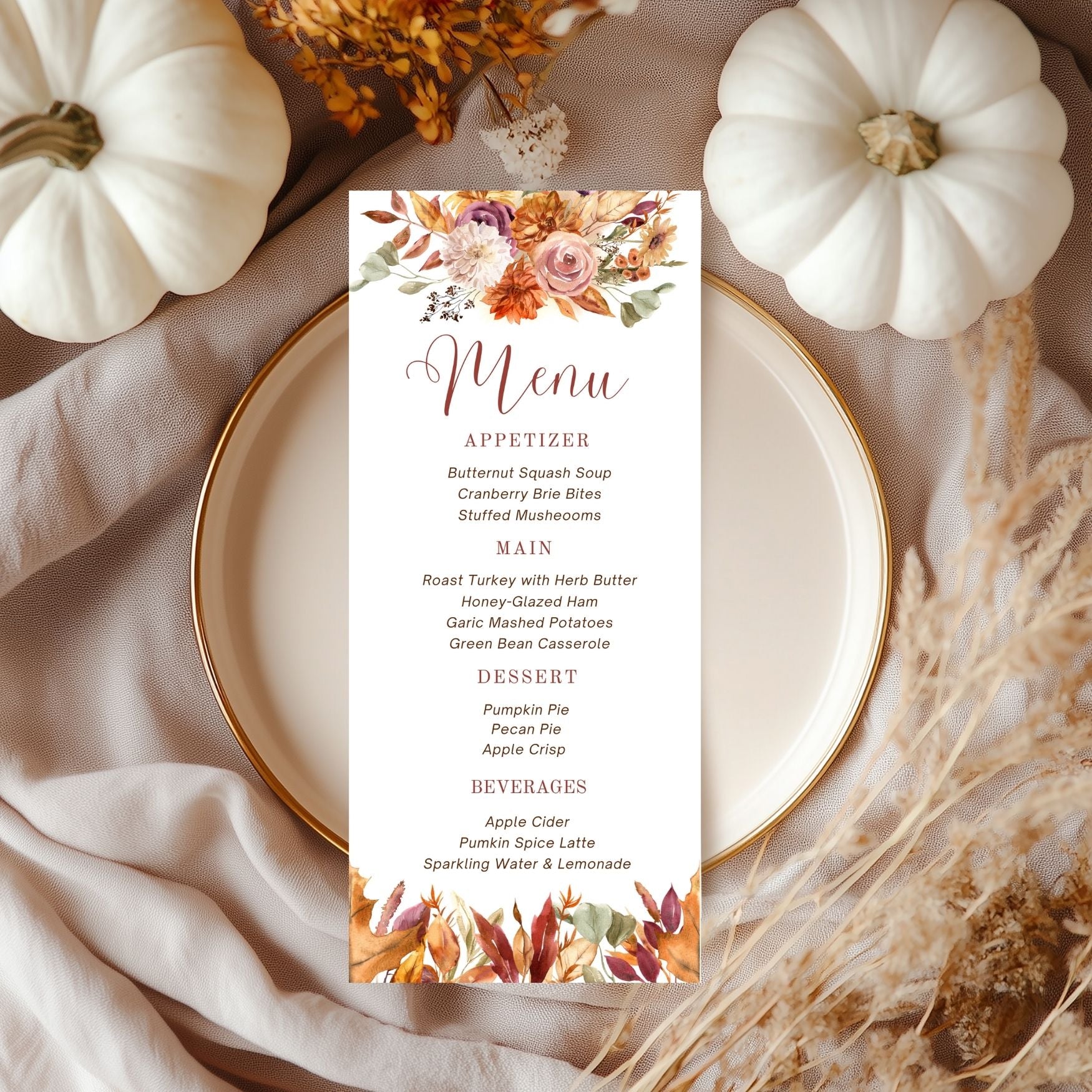 Fall Floral Menu card with autumn-themed design on a plate with pumpkins and dried flowers.
