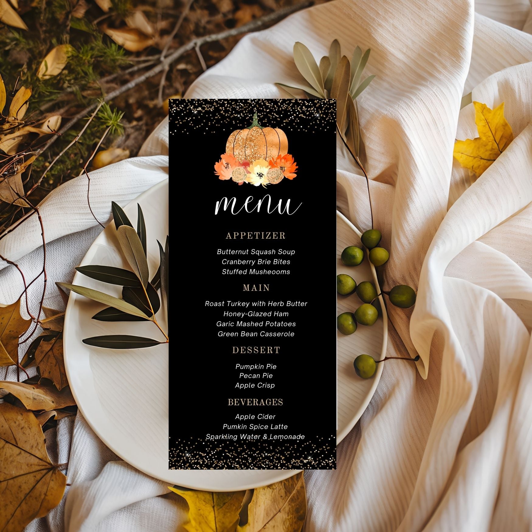 Pumpkin Menu card for a fall-themed dinner with pumpkins and leaves on a white plate.