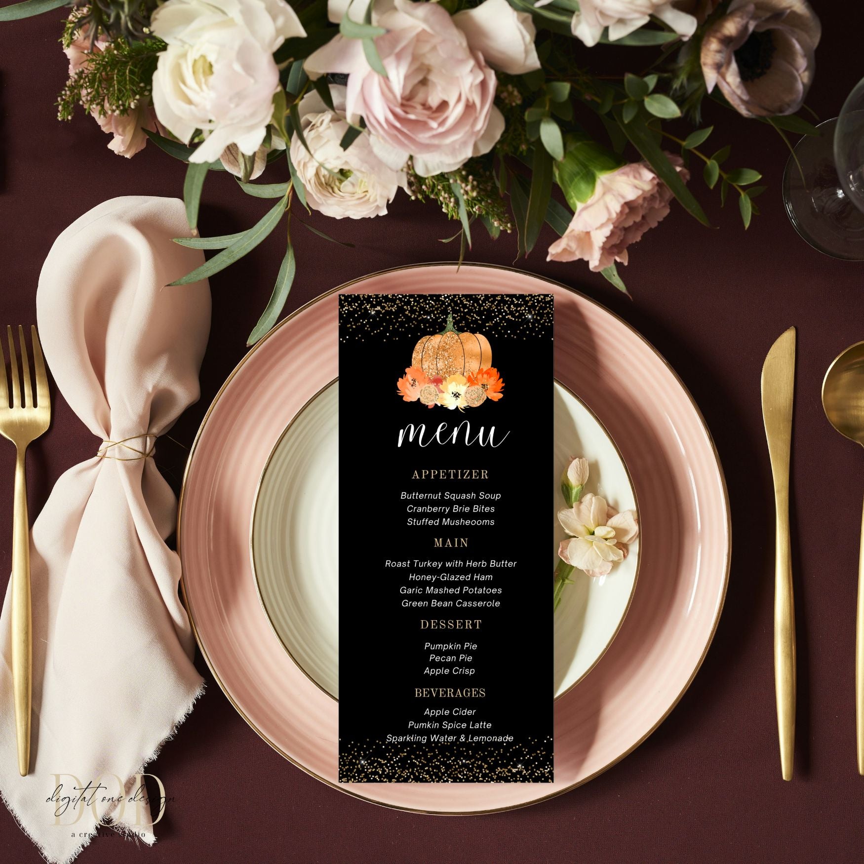 Table setting with a Pumpkin menu card, plates, and flowers on a dark surface