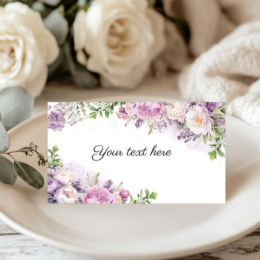 Purple floral and pearls  card with placeholder text on a table with flowers