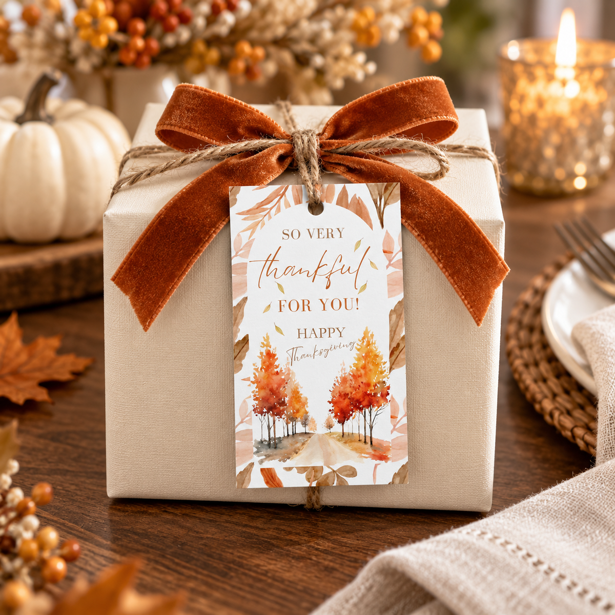 Printable Thanksgiving Favor Gift Tag Instant Download attached to a beautifully wrapped gift with fall decorations.