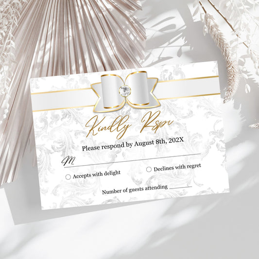 Response card with a decorative White and Gold bow on a white background