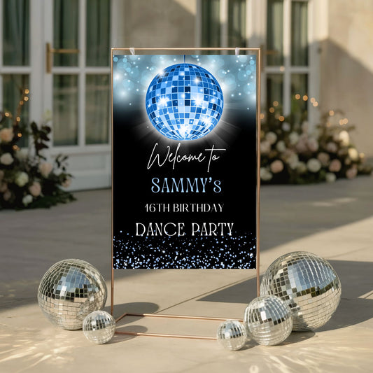 Birthday party sign with Blue disco ball design in front of floral decorations.