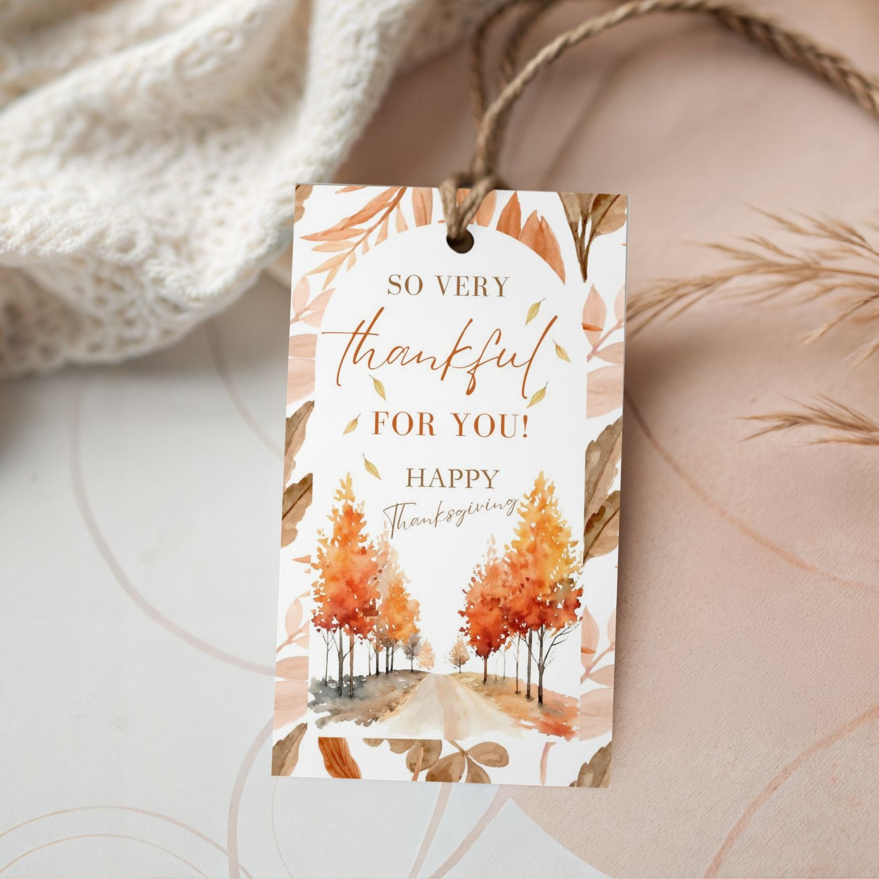 Thanksgiving gift tag with autumn trees and text on a neutral background