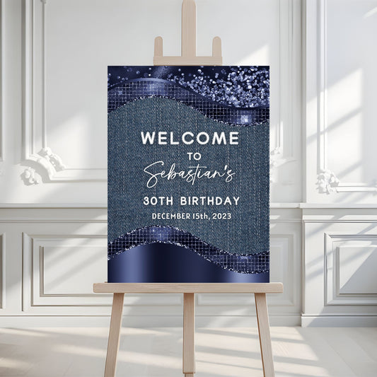 Birthday welcome sign on an easel against a white wall