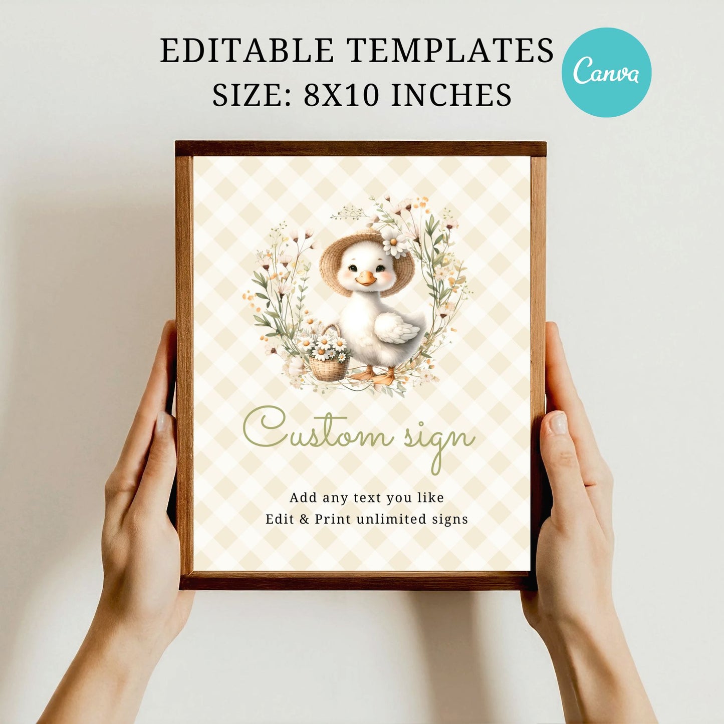 Framed customizable sign with a duck design held by hands against a plain background