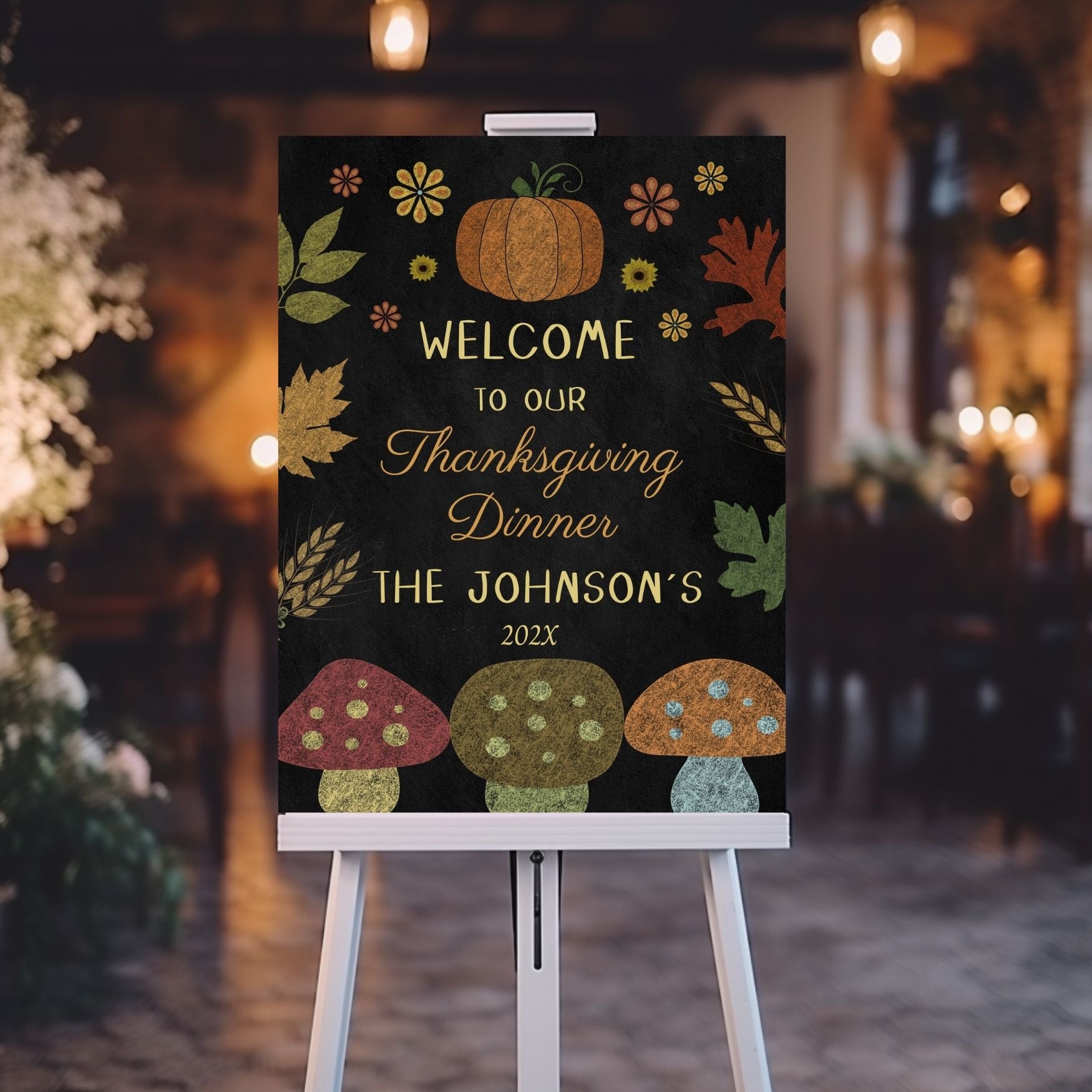 Thanksgiving dinner welcome sign with pumpkins, leaves, and mushrooms on a black background.