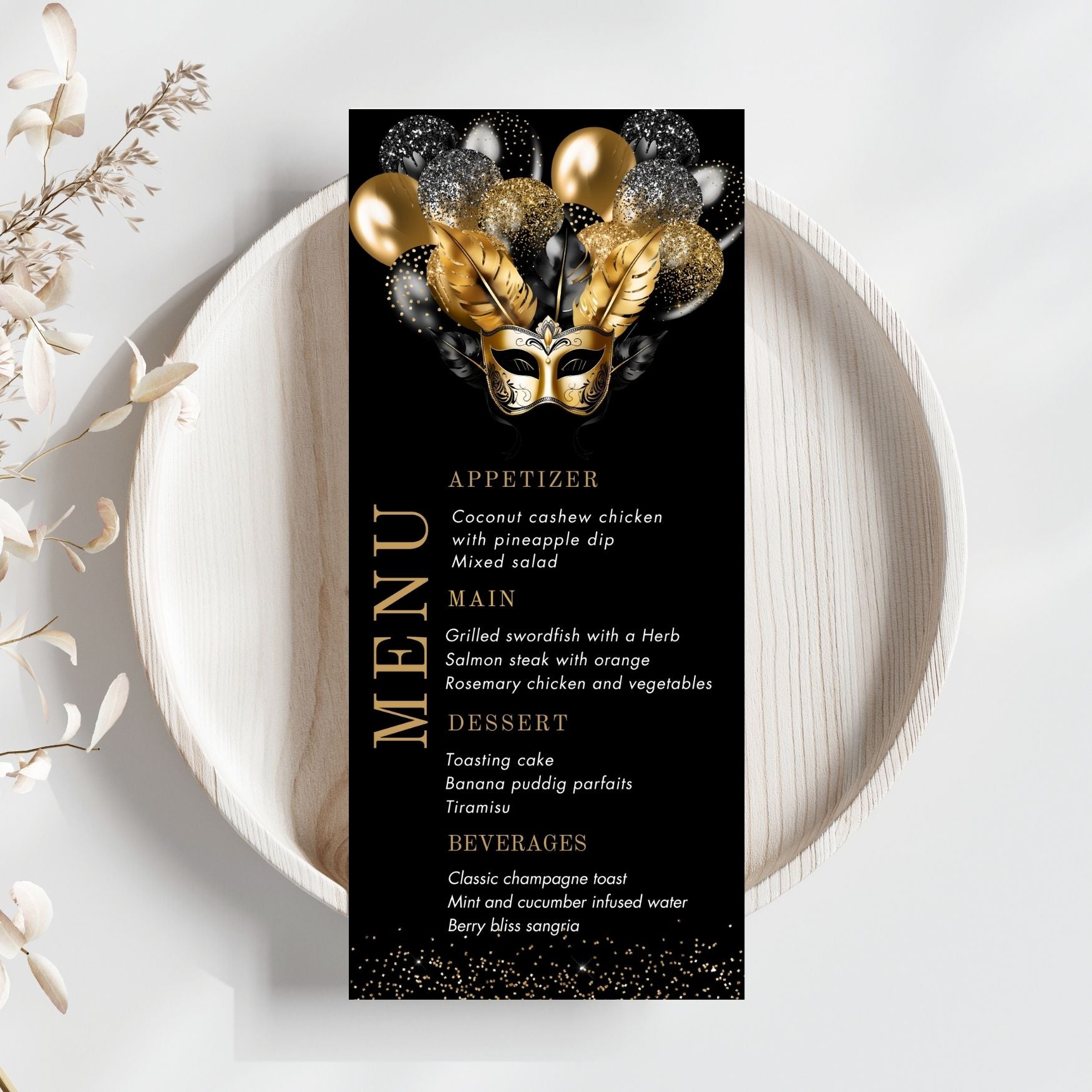 Black Menu card with a gold mask design on a black background, placed on a white plate with decorative elements.
