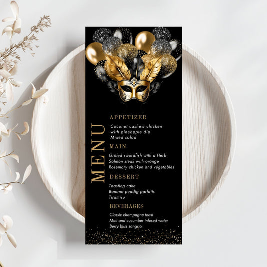 Black Menu card with a gold mask design on a black background, placed on a white plate with decorative elements.