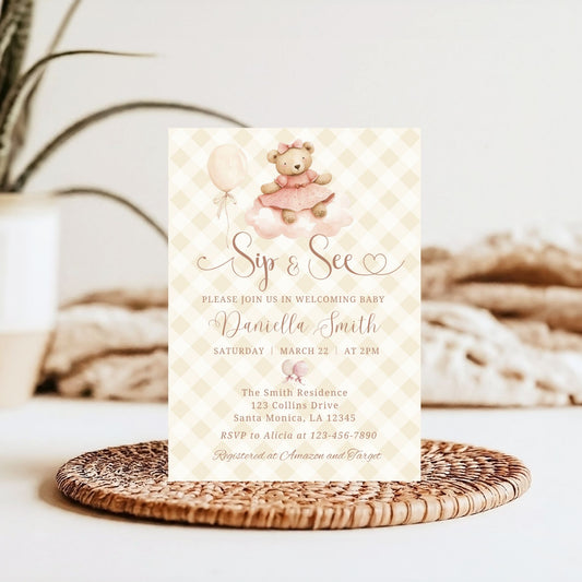 Pink Baby shower invitation with teddy bear and balloons on a textured surface