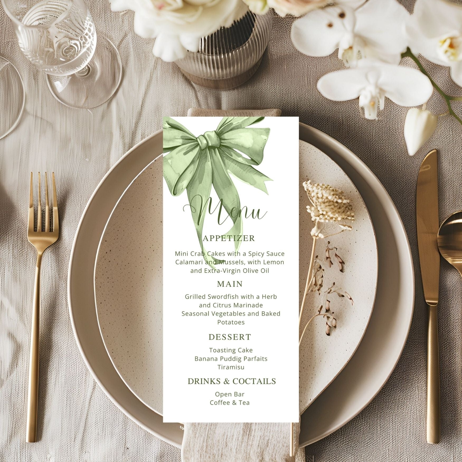 Table setting with a menu card featuring a sage green bow design.