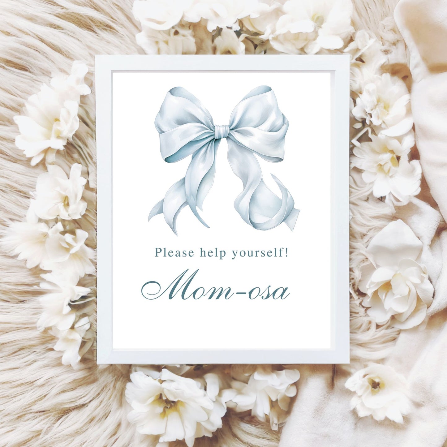 Framed print with a blue bow and text 'Please help yourself! Mom-osa' surrounded by white flowers and fabric.